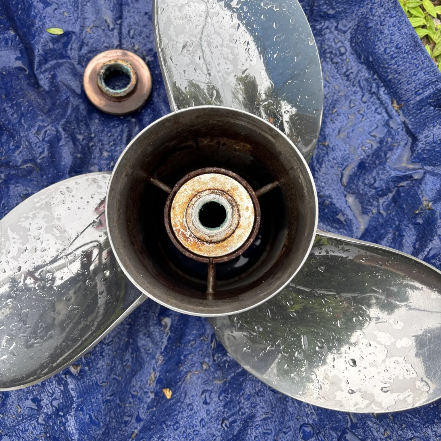 Outboard propeller and prop shaft inspected during annual maintenance