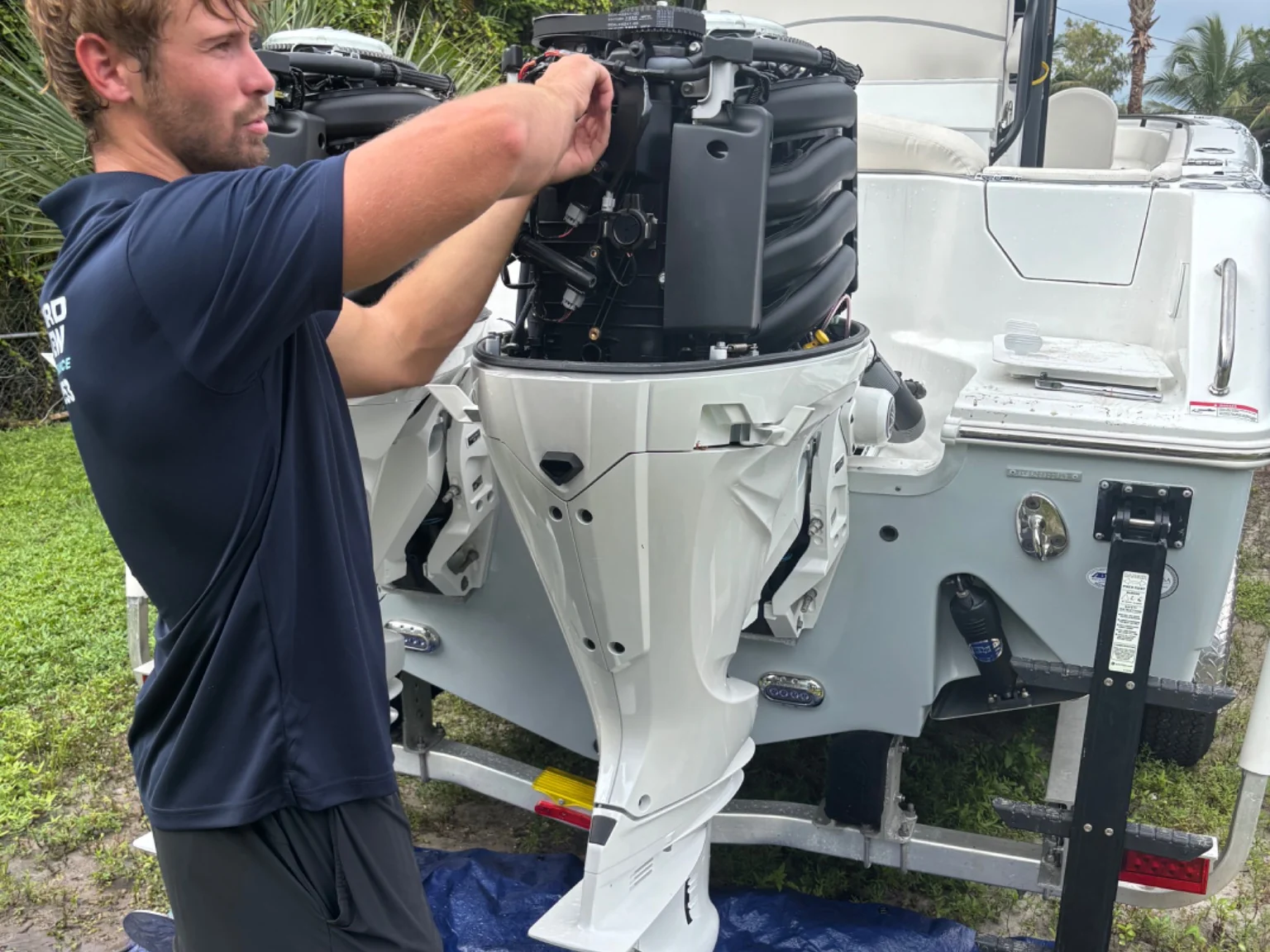 Outboard Pit Crew technician doing mobile Yamaha outboard service