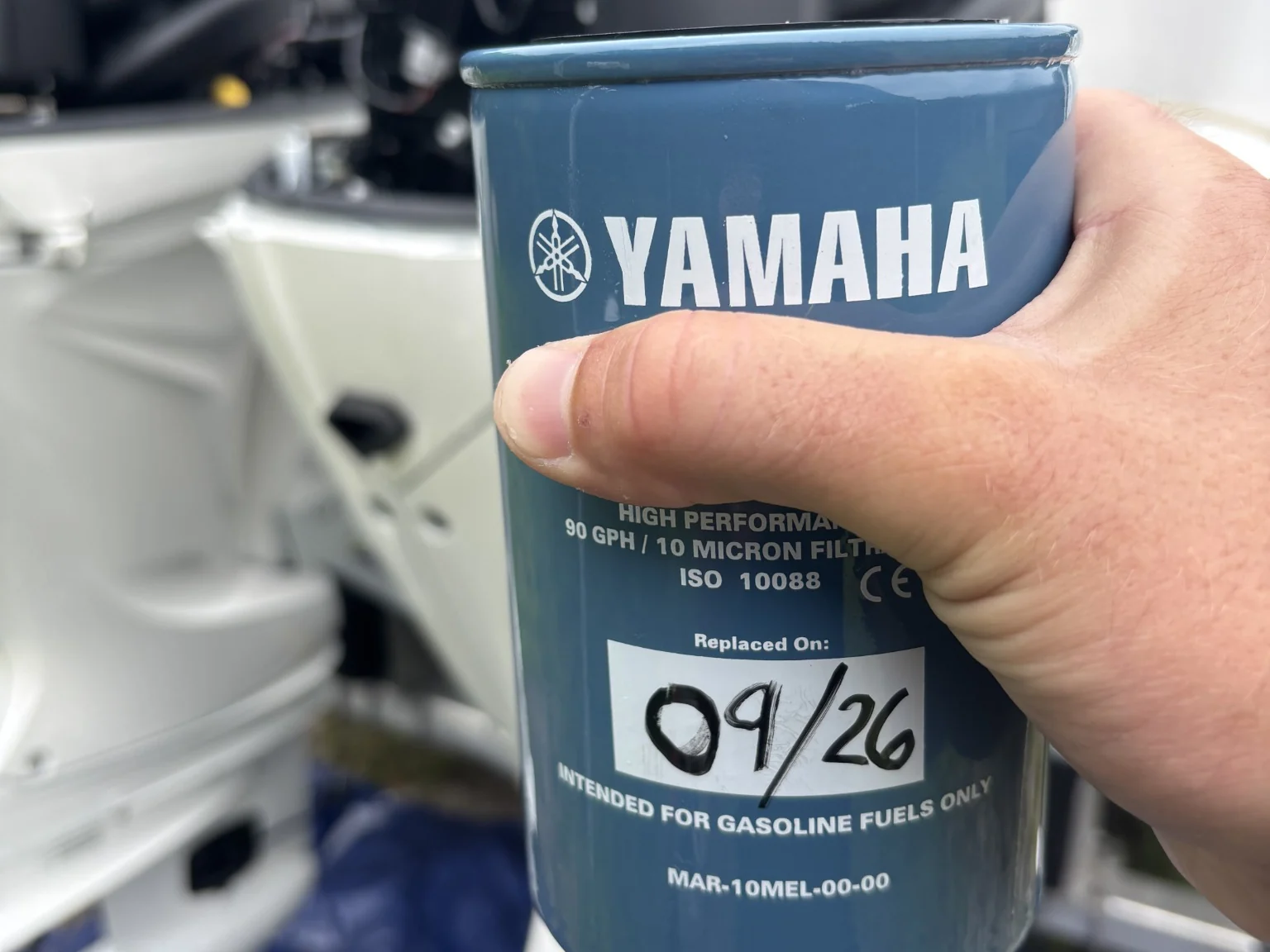 Yamaha fuel water separator inspected during routine outboard maintenance